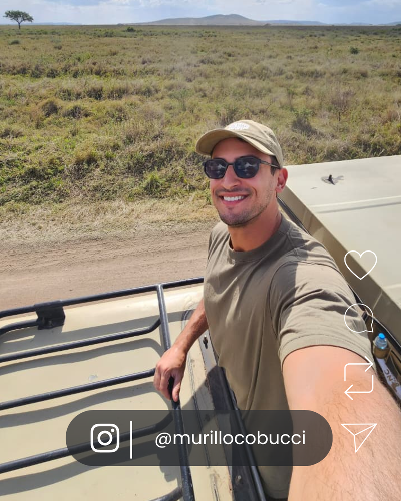 Content creator wearing VOYA sunglasses during a sunny afternoon