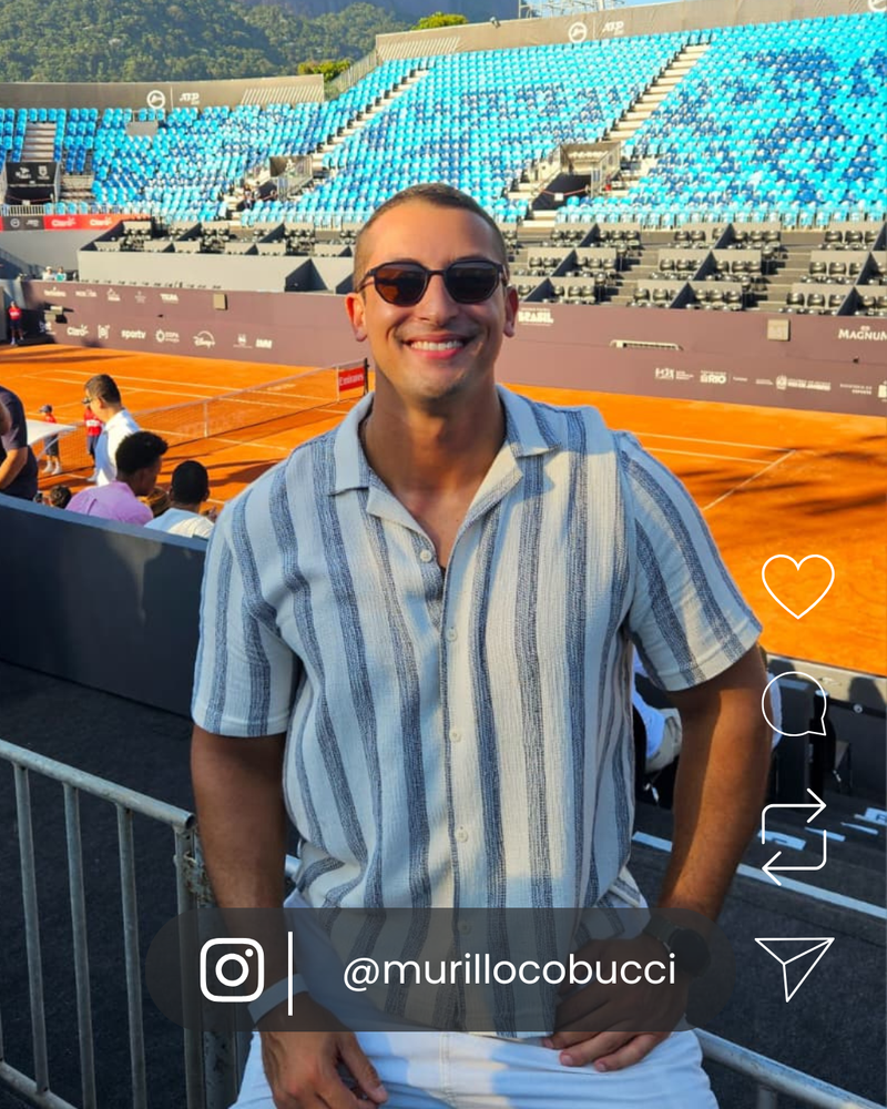 Man wearing classic black VOYA sunglasses on a sunny day